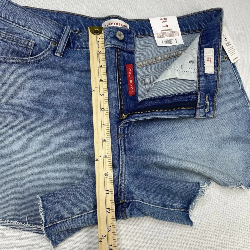 Lucky Brand Women's Sz 12/31 90s‎ Midi Shorts High Rise Raw Hem Medium Wash